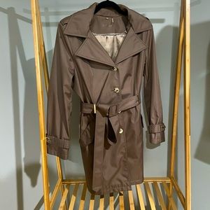 Calvin Klein rain coat, 3/4 length. Beautiful brown color with gold accents.